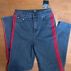 Black jeans with red lines